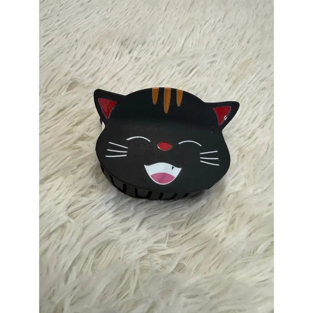 Large Black cat hair clip claw with white whiskers, red nose, and pink mouth